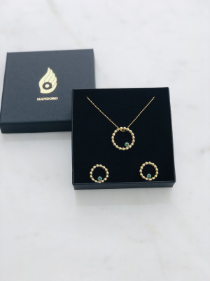 Set aus 925er Sterlingsilber, vergoldet. Mit grünen Edeltopasen.